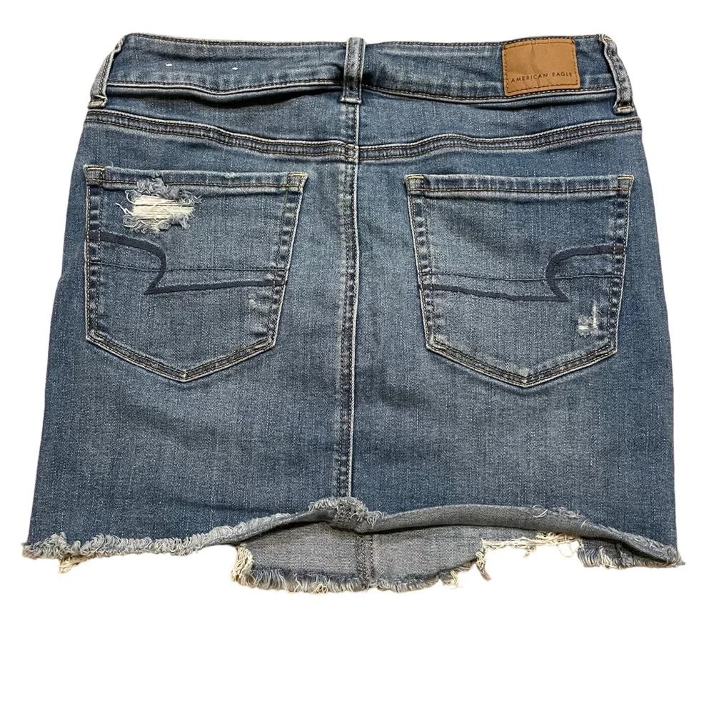 American Eagle High Rise Distressed Mini Jean Skirt.  Size 6